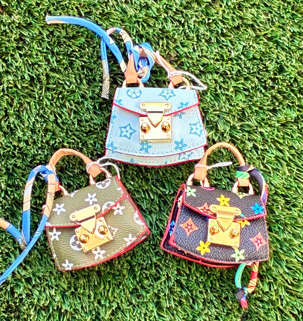 Lv Mini Purse Keychains 3 for $20